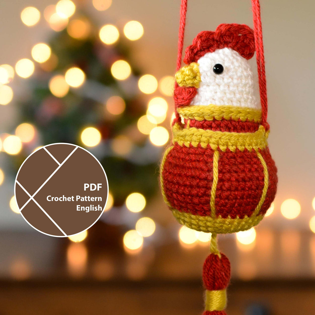 A crochet pattern for making a rooster and its red lantern for lunar new year celebrations. A label on the lower left corner indicates that this listing is a PDF crochet pattern that is written in English.