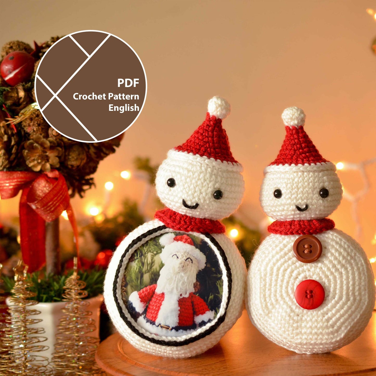 Two crocheted snowman ornaments with red Santa hats. One snowman has a round picture frame with a Santa Claus image inside. The other snowman has two buttons.
