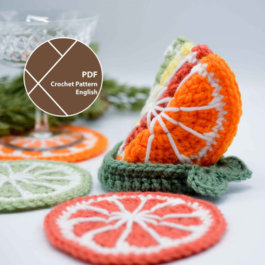 Crochet pattern for a set of citrus fruit coasters. The pattern includes instructions for making a lime, orange, and grapefruit coaster. The pattern is available in PDF format and is written in English.