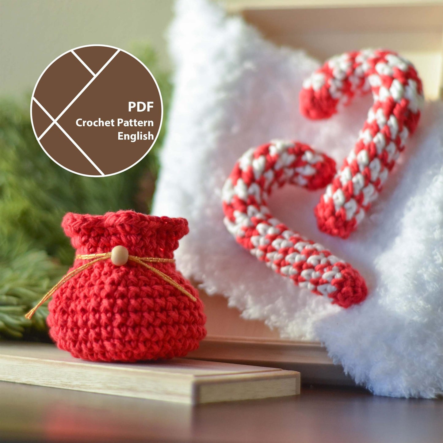 Christmas crochet projects, a red crochet bag with a gold ribbon and a wooden bead, and two red and white candy cane ornaments.