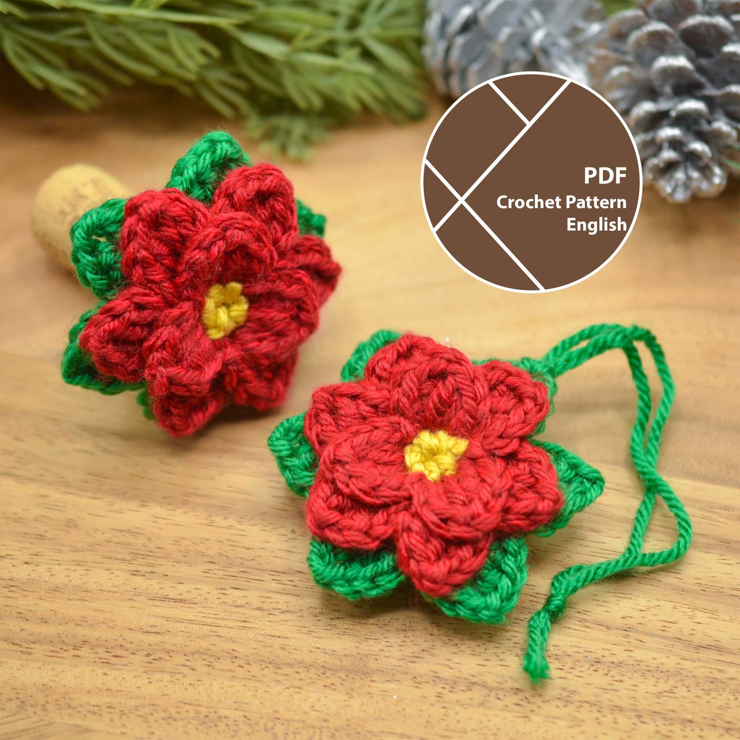 Crochet pattern for poinsettia ornaments.  PDF download includes English instructions. Two red poinsettia ornaments with green leaves are shown; one is attached to a wine cork, the other has a green cord for hanging.  Perfect for Christmas decorations.
