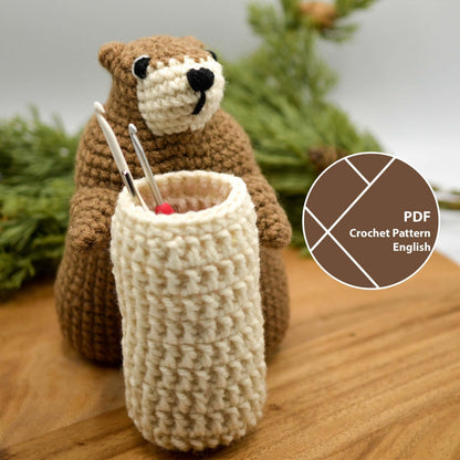 A crochet pattern for making a groundhog and a basket for crochet hooks. 