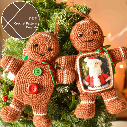 Two crocheted gingerbread man ornaments. One gingerbread man has a green and red ribbon and the other has a picture frame with a crocheted Santa Claus inside.